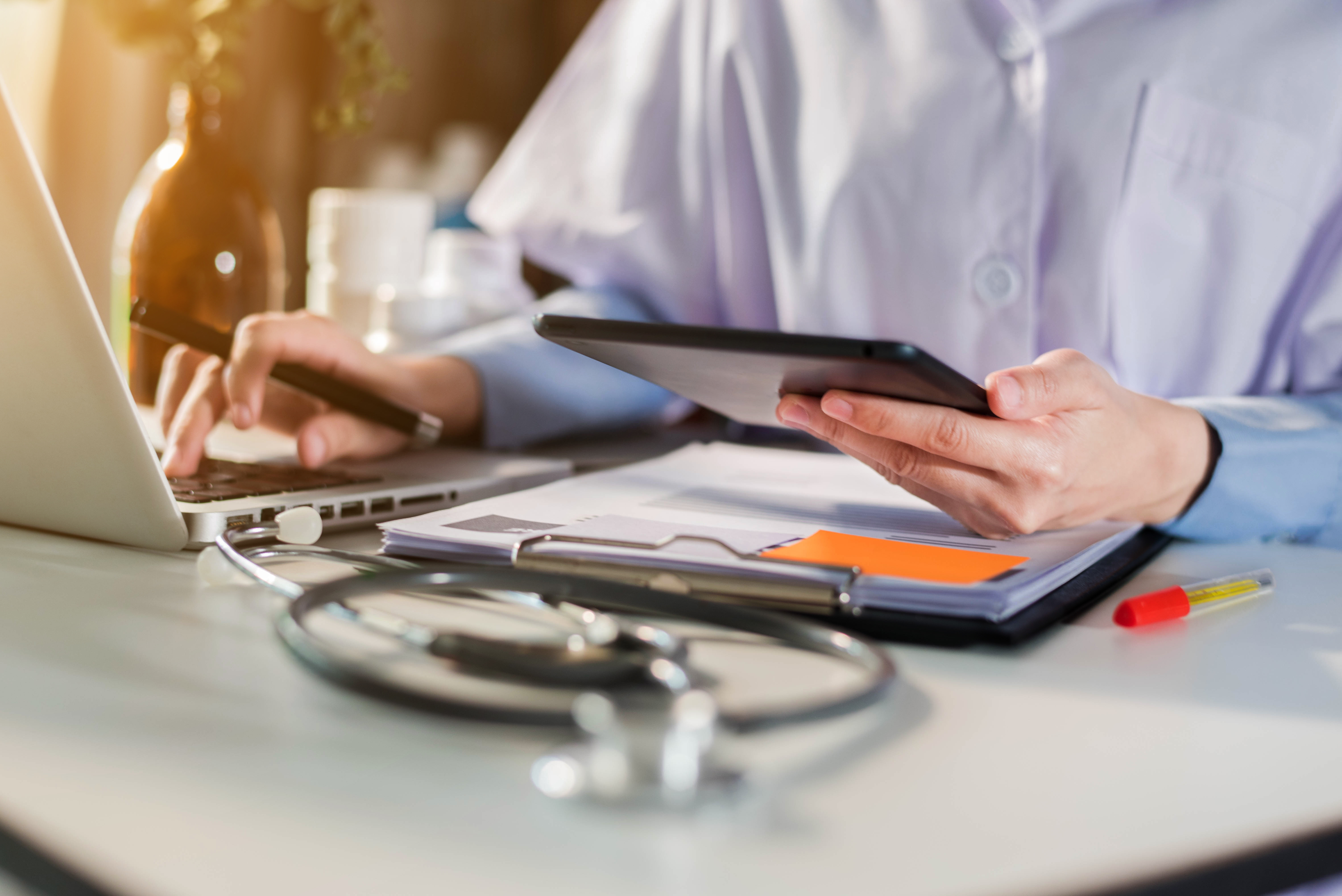 Medicine doctor hand working with modern digital tablet computer interface as medical network concept.